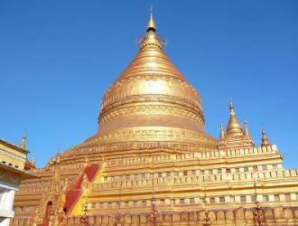 The golden building is the Shwe Zigon Pagoda, Bagan.
